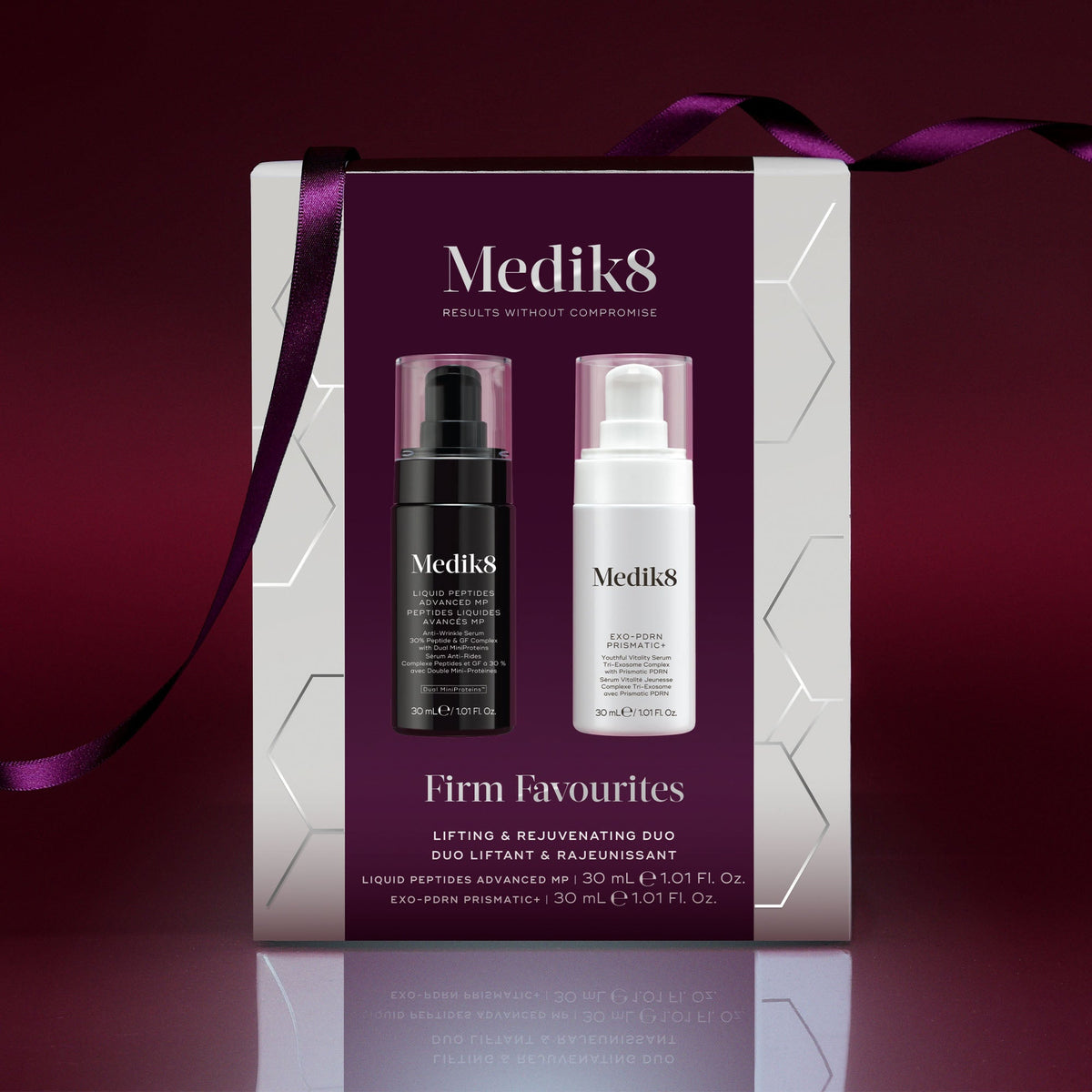 Medik8 Firm Favourites festive gift box wrapped in ribbon