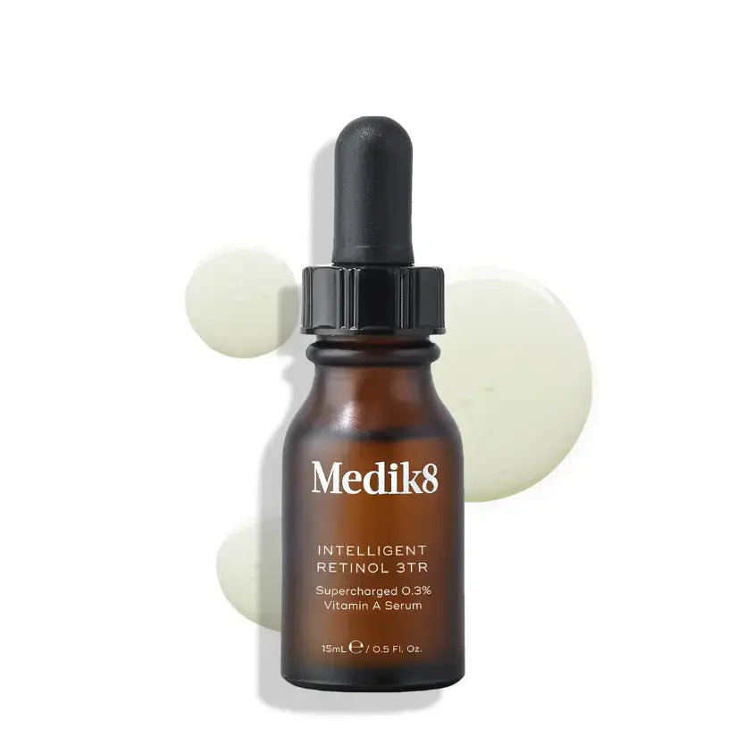 Medik8™ Intelligent Retinol serum with 0.3% retinol in a brown dropper bottle for skincare.