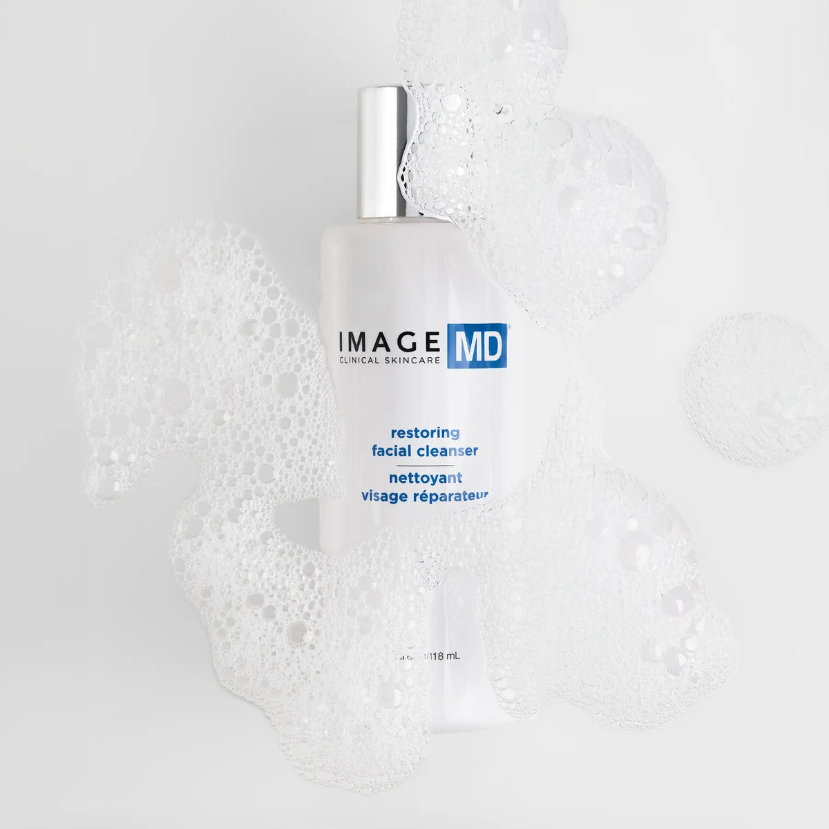 IMAGE Skincare MD Restoring Facial Cleanser bottle with foaming lather