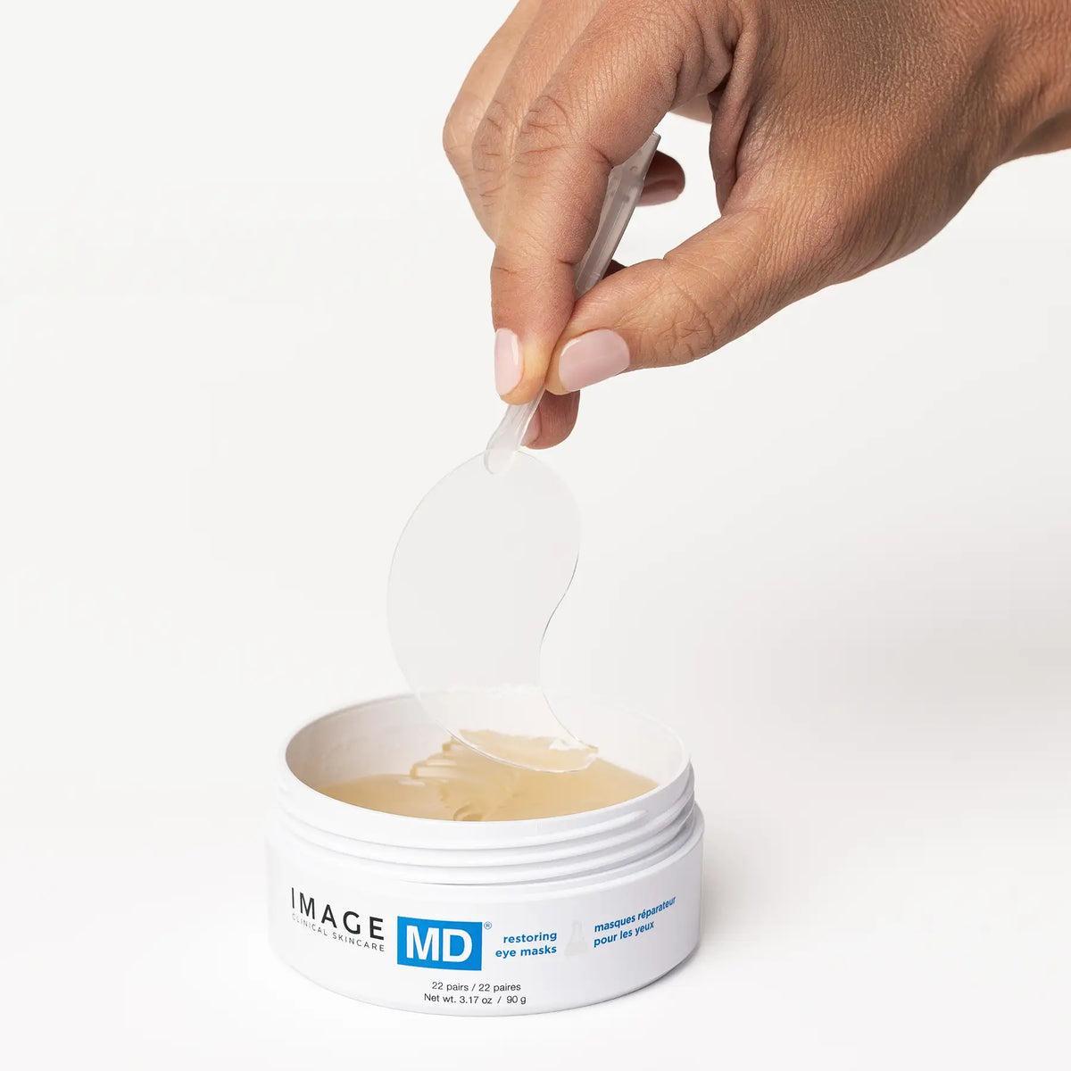 IMAGE Skincare MD Restoring Eye Masks hydro-gel mask lifted with tweezers