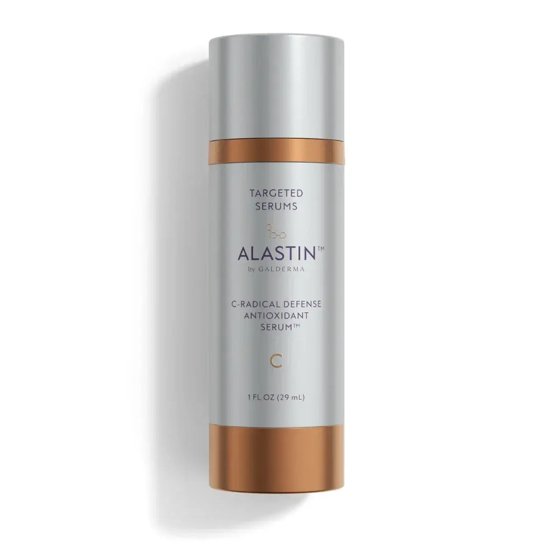 ALASTIN C-RADICAL Defense Antioxidant Serum in a sleek silver and gold bottle, promoting antioxidant protection.