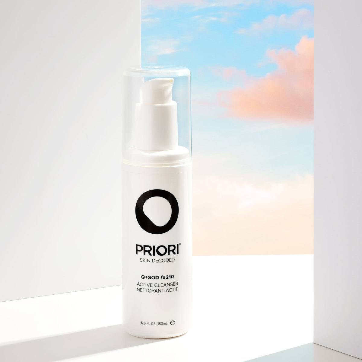 PRIORI Q+SOD Active Cleanser bottle in natural light