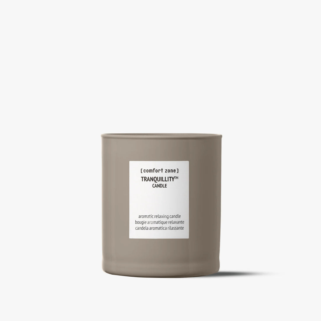 Comfort Zone Tranquillity™ Candle in a minimalist container, offering 55+ hours of soothing aromatherapy.