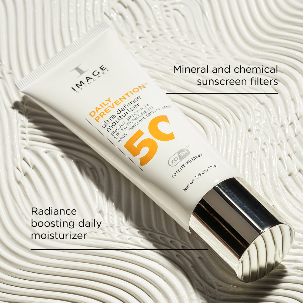 IMAGE Skincare DAILY PREVENTION Ultra Defence Moisturiser SPF 50 tube with radiance-boosting and mineral and chemical filter callouts
