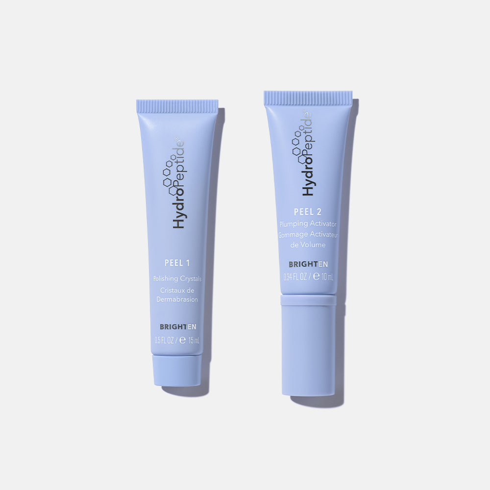 HydroPeptide Glow Like a Pro kit in a lilac skincare bag with Foaming Cream Cleanser, Polish & Plump Peel 1 and 2, Radiance Mask and Firma-Bright sachets