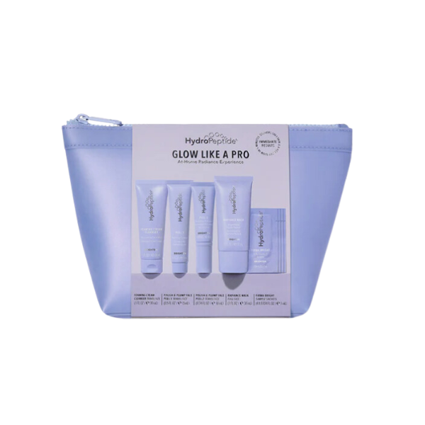 HydroPeptide Glow Like a Pro kit in a lilac skincare bag with Foaming Cream Cleanser, Polish & Plump Peel 1 and 2, Radiance Mask and Firma-Bright sachets