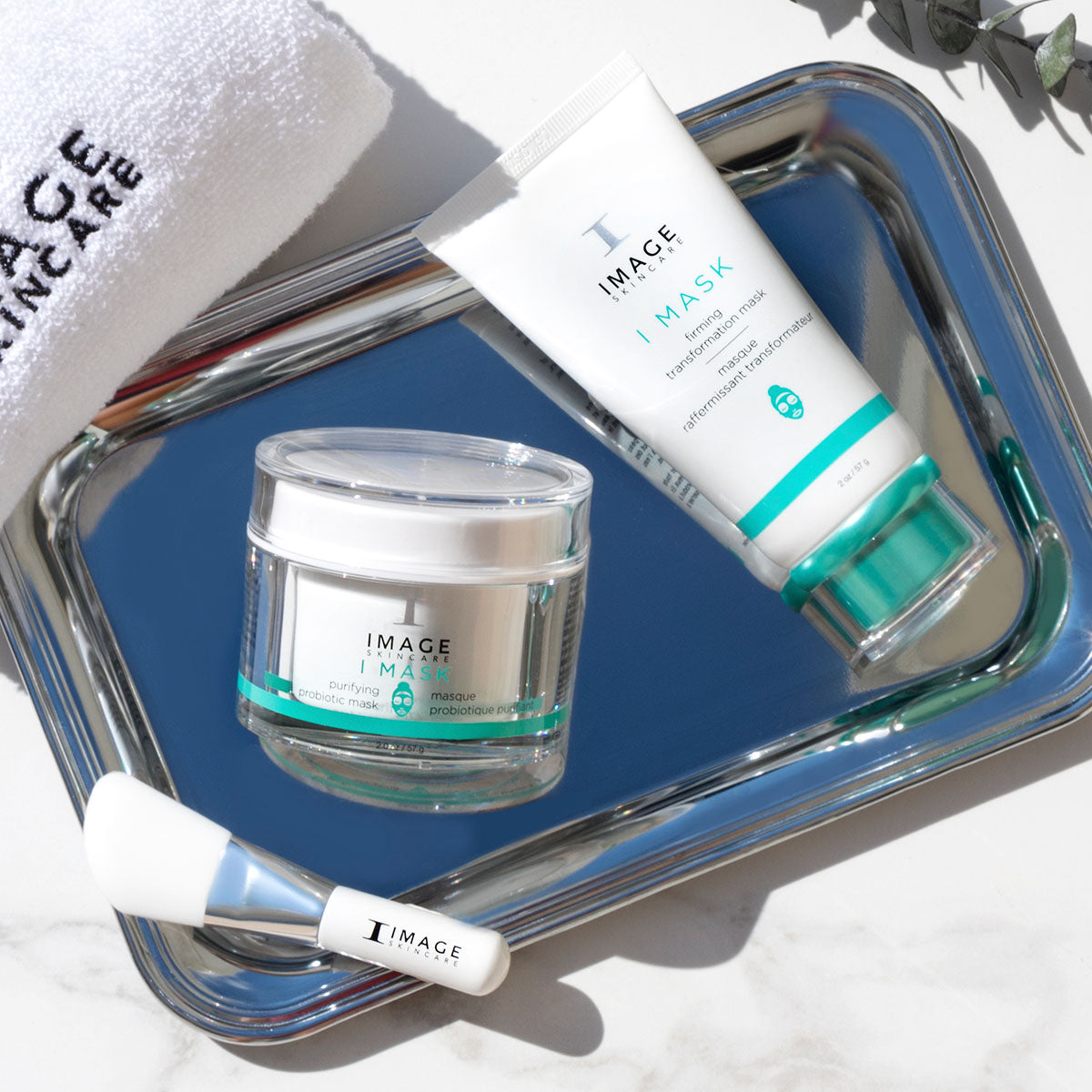 IMAGE Skincare I MASK Firming Transformation Mask with the I MASK purifying probiotic mask on a tray