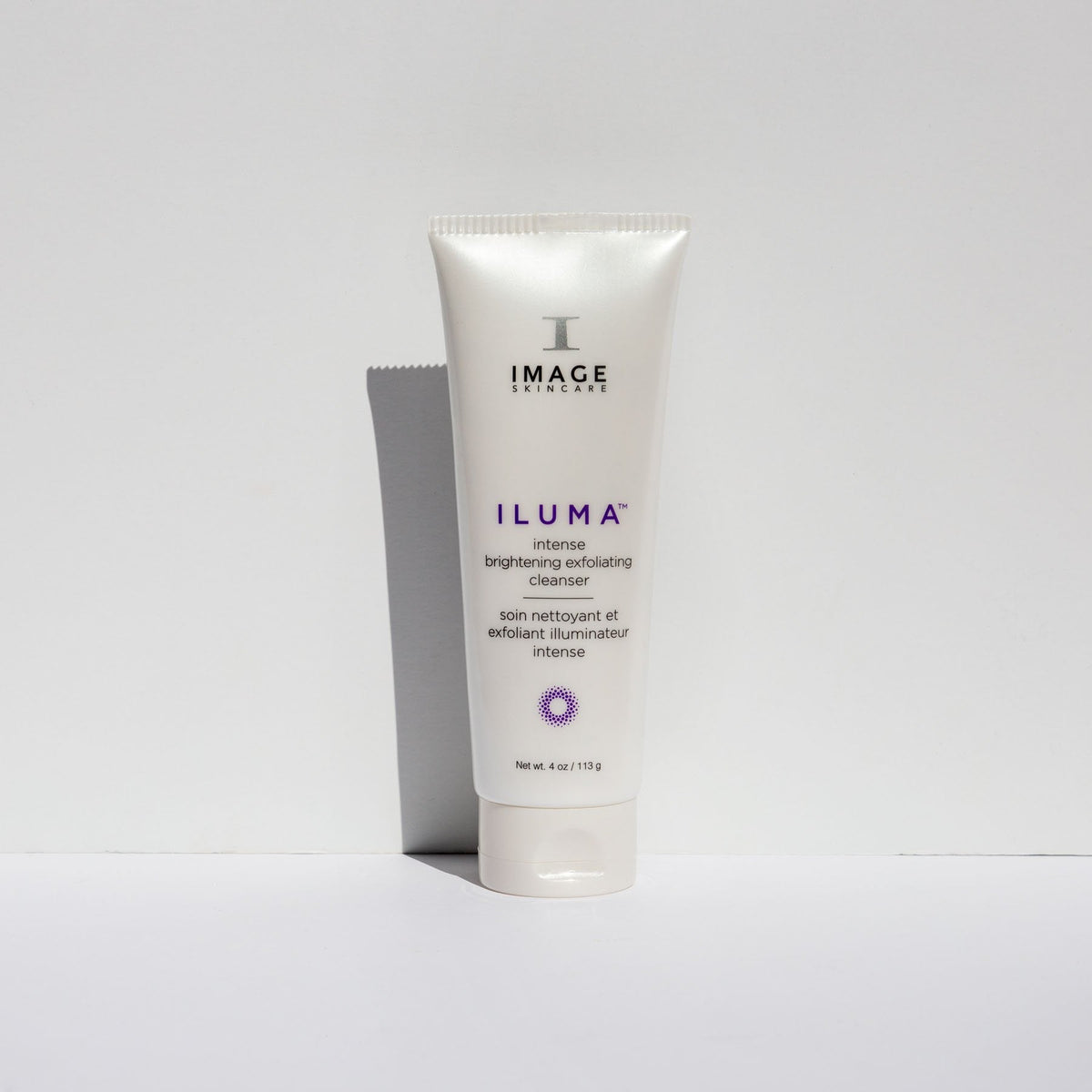 IMAGE Skincare ILUMA Intense Brightening Exfoliating Cleanser tube on a white surface