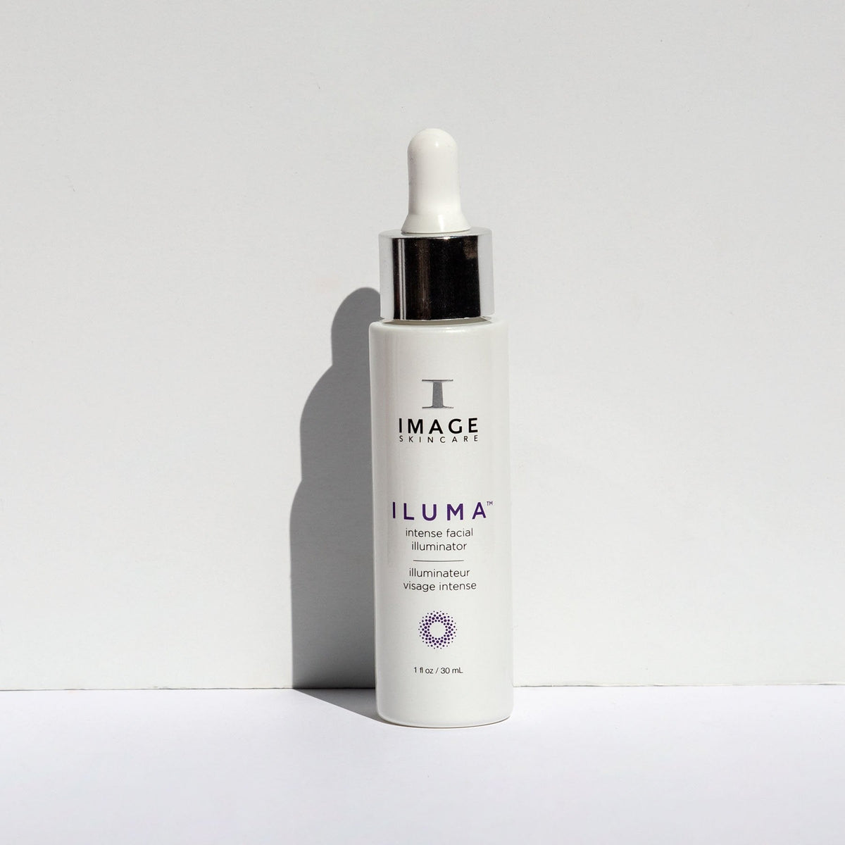 IMAGE Skincare ILUMA Intense Facial Illuminator bottle on a white surface