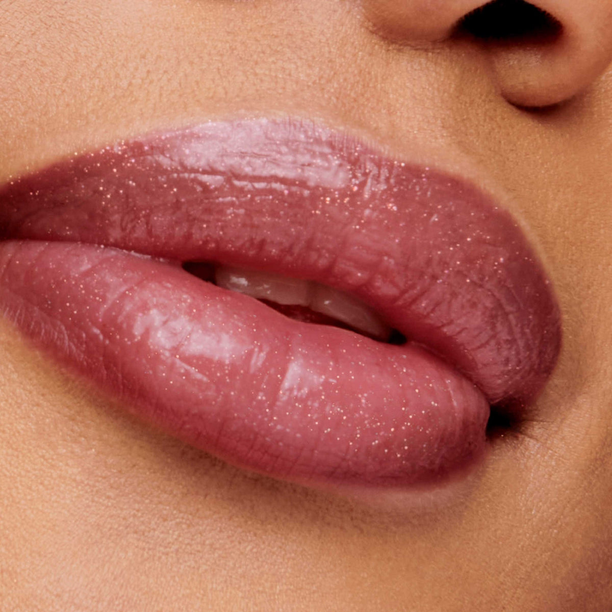 Jane Iredale HydroPure Hyaluronic Lip Gloss in Candied Rose worn on the lips