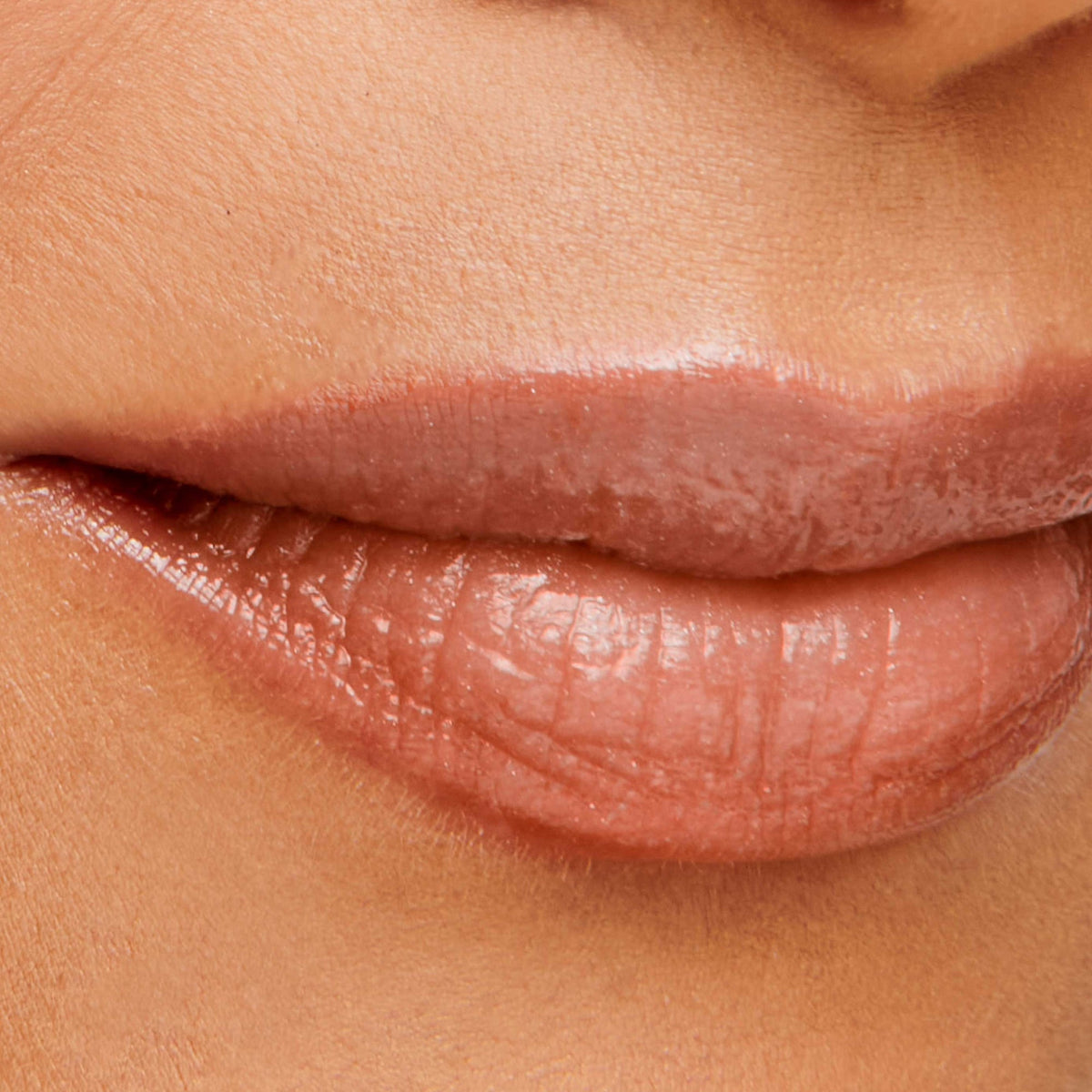 Jane Iredale HydroPure Hyaluronic Lip Gloss in Sangria worn on the lips