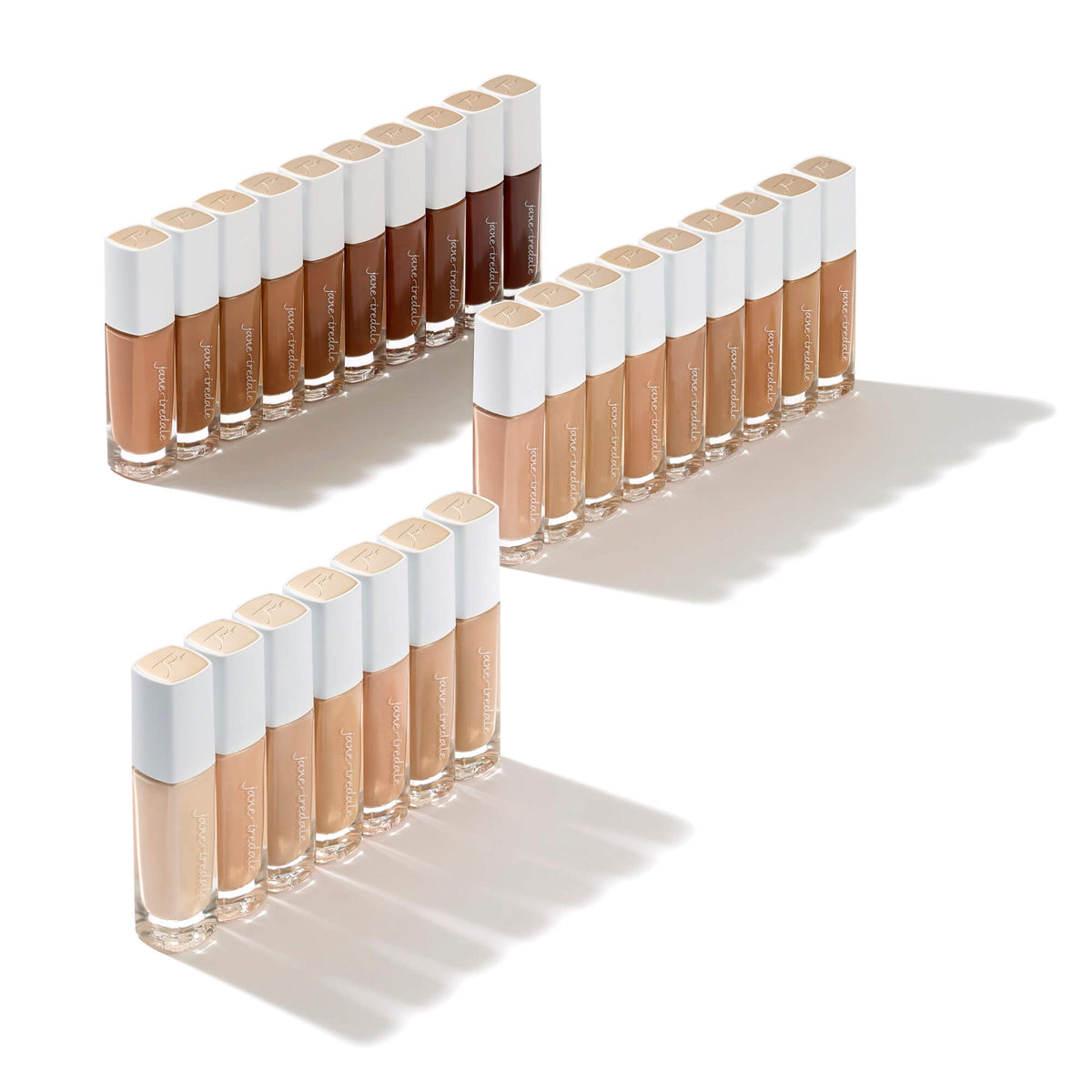 Jane Iredale Skintuition SPF 30 Liquid Foundation bottles across the shade range