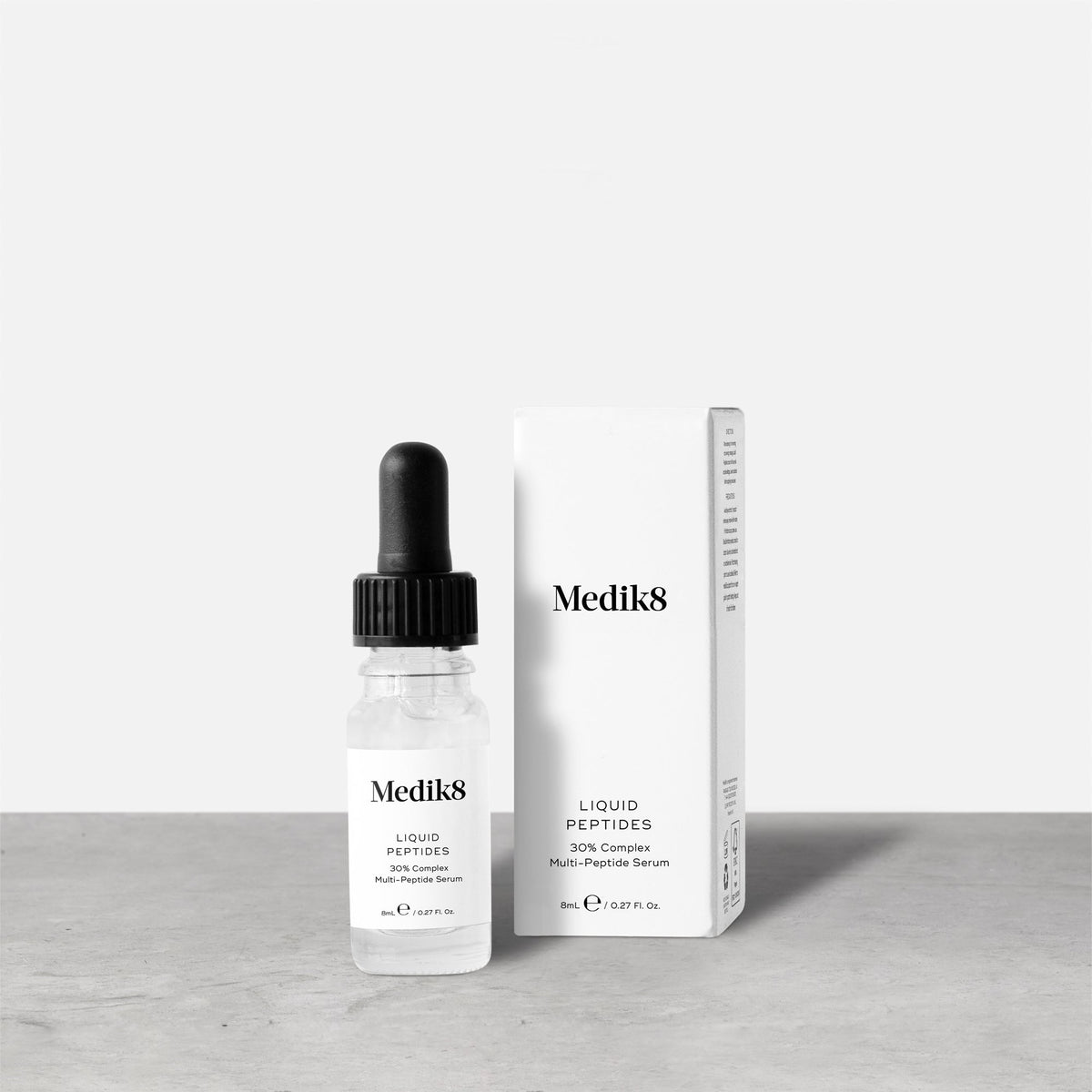 Medik8 Liquid Peptides Travel Size 8ml bottle shown with its box