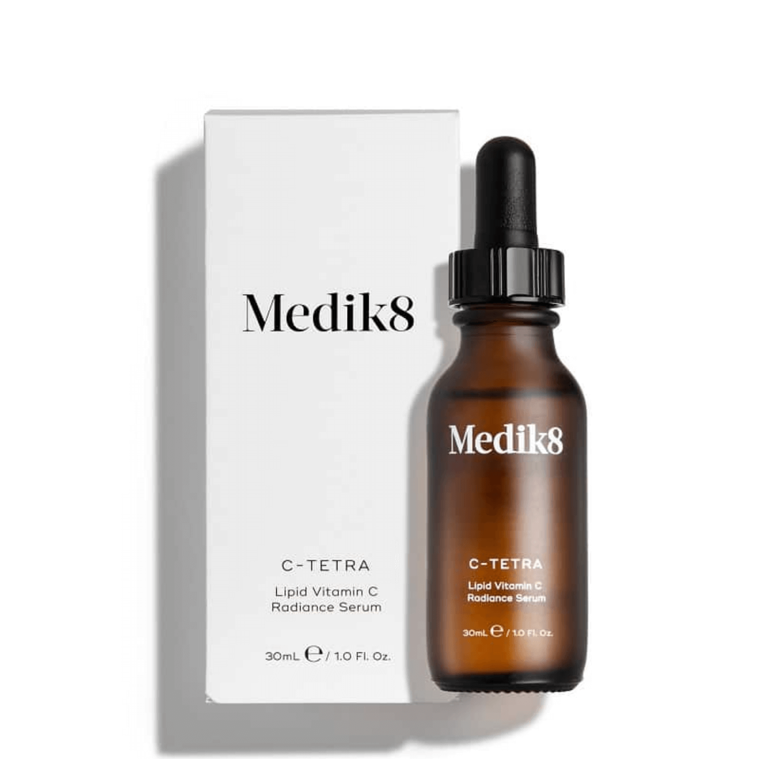 Medik8 C-Tetra vitamin C radiance serum in amber bottle with dropper and white box.