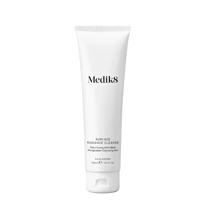 Medik8 Surface Radiance Cleanse™ exfoliating cleanser in a sleek tube, ideal for brightening and smoothing skin.