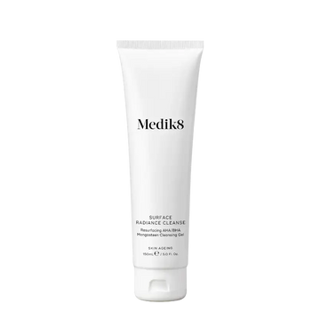 Medik8 Surface Radiance Cleanse™ exfoliating cleanser in a sleek tube, ideal for brightening and smoothing skin.