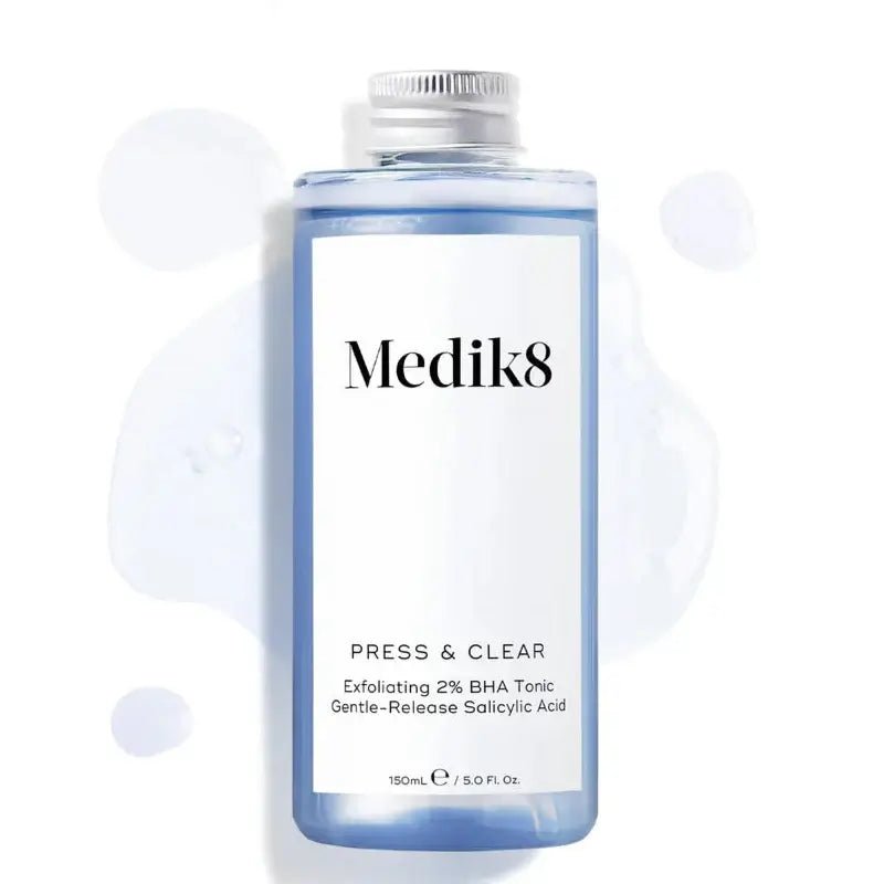 Medik8 Press & Clear bottle featuring exfoliating 2% BHA tonic with gentle-release salicylic acid for clearer skin.