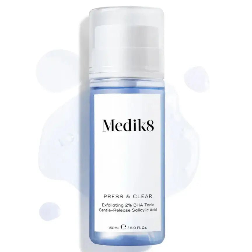 Medik8 Press & Clear exfoliating tonic bottle with 2% BHA salicylic acid for clearer skin.