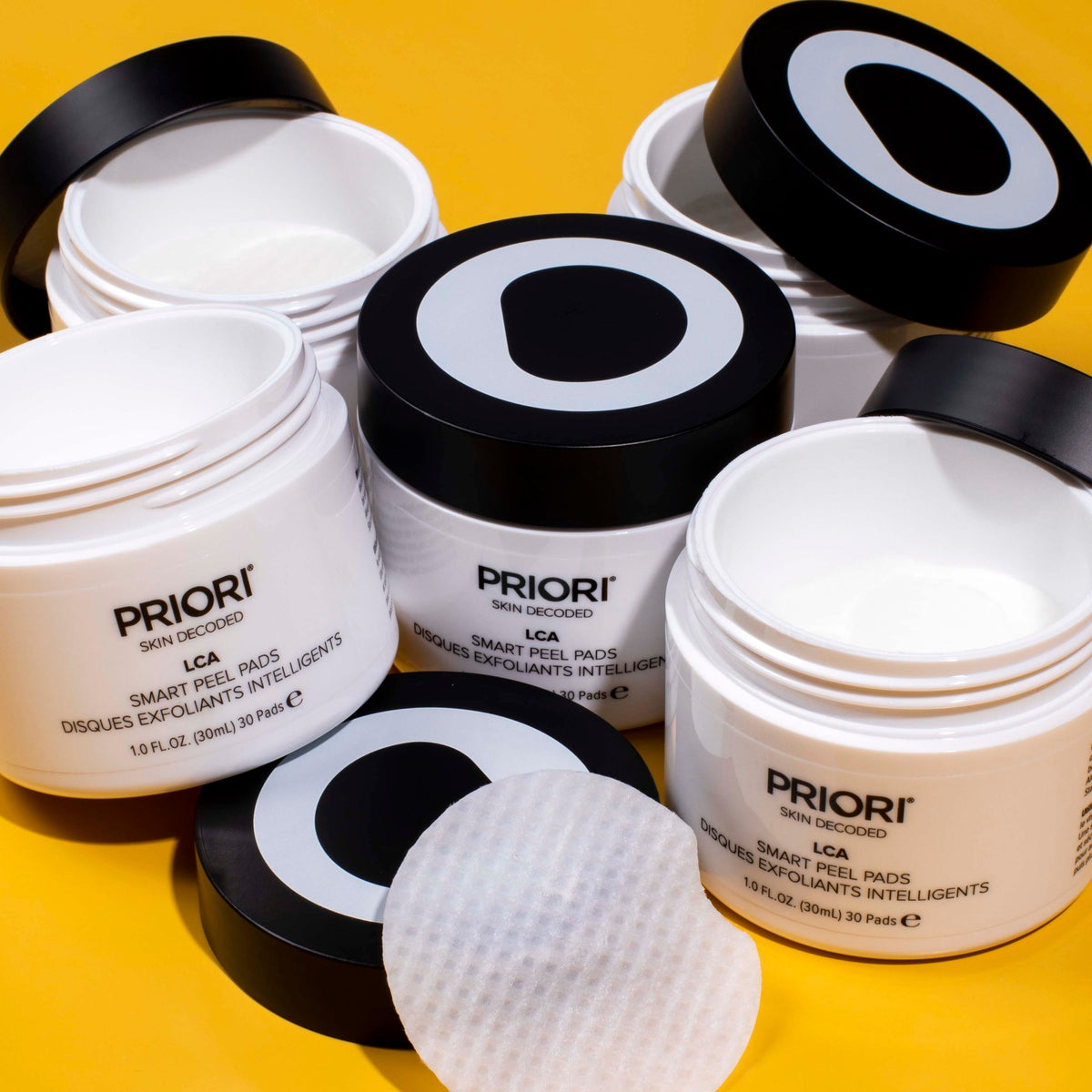 PRIORI Smoothing Peel Pads open jars showing the pads