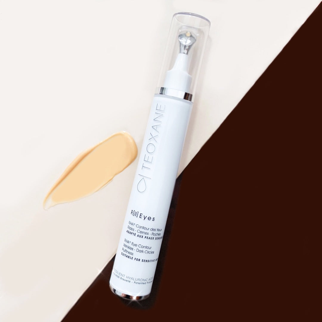 Teoxane RII Eyes eye cream bottle with tinted cream swipe