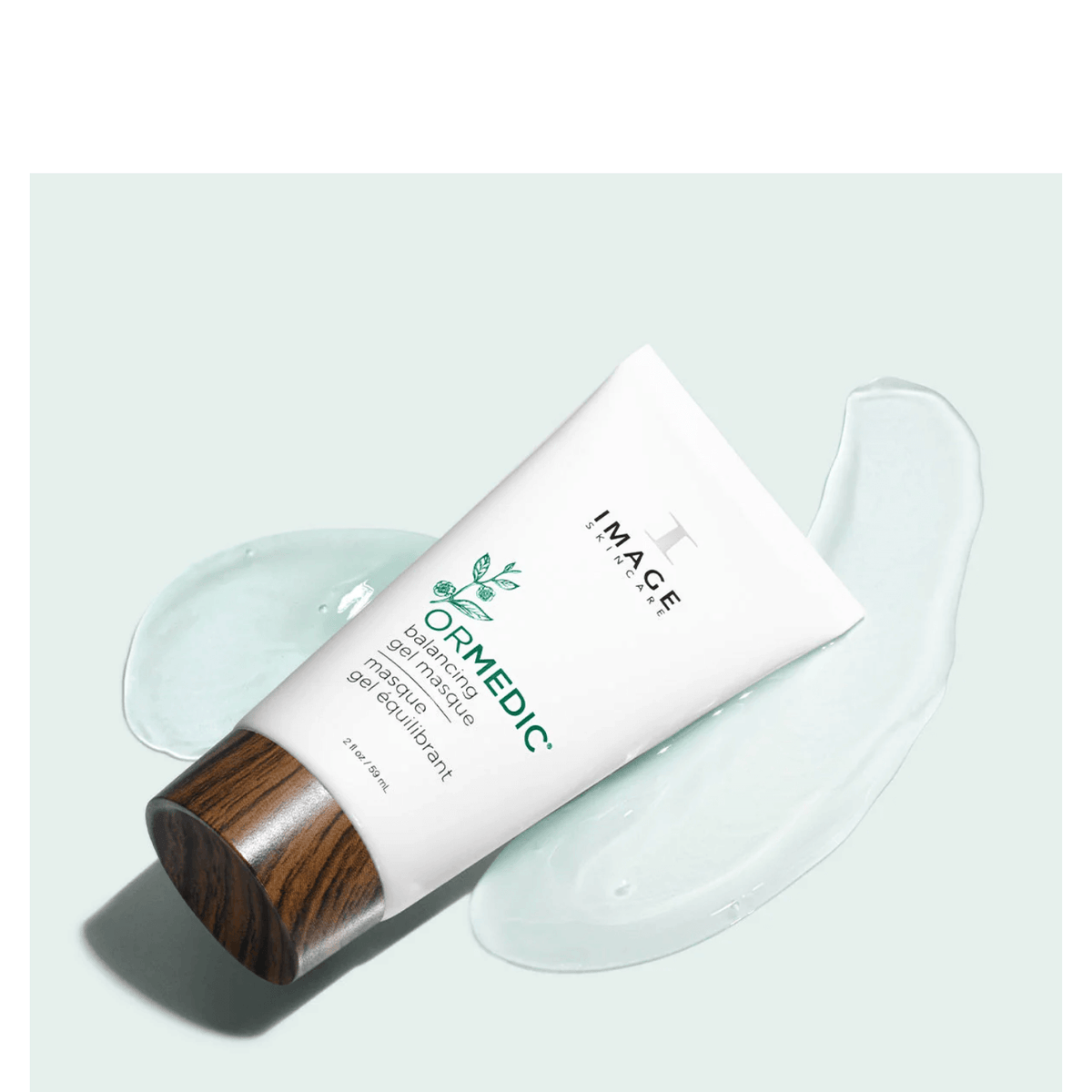 IMAGE Skincare ORMEDIC Balancing Gel Masque tube beside swatches of the clear soothing gel texture