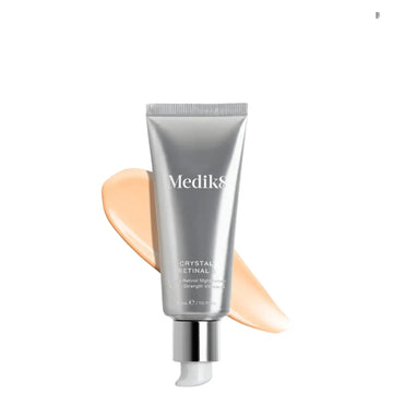 Medik8 Crystal Retinal 6™ in a silver tube with product swatch, clinically proven to reduce wrinkles and improve skin firmness.