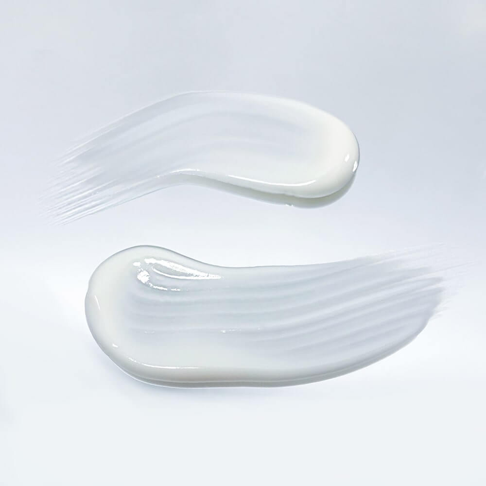 Dr LEVY Intense Stem Cell Booster Cream creamy texture swatches on a light background