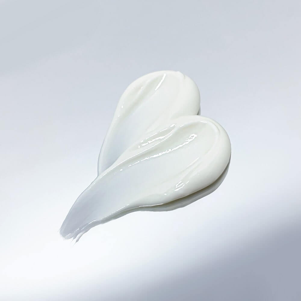 Dr LEVY R3 Cell Matrix Mask cream texture in two elegant swatches on a reflective surface.