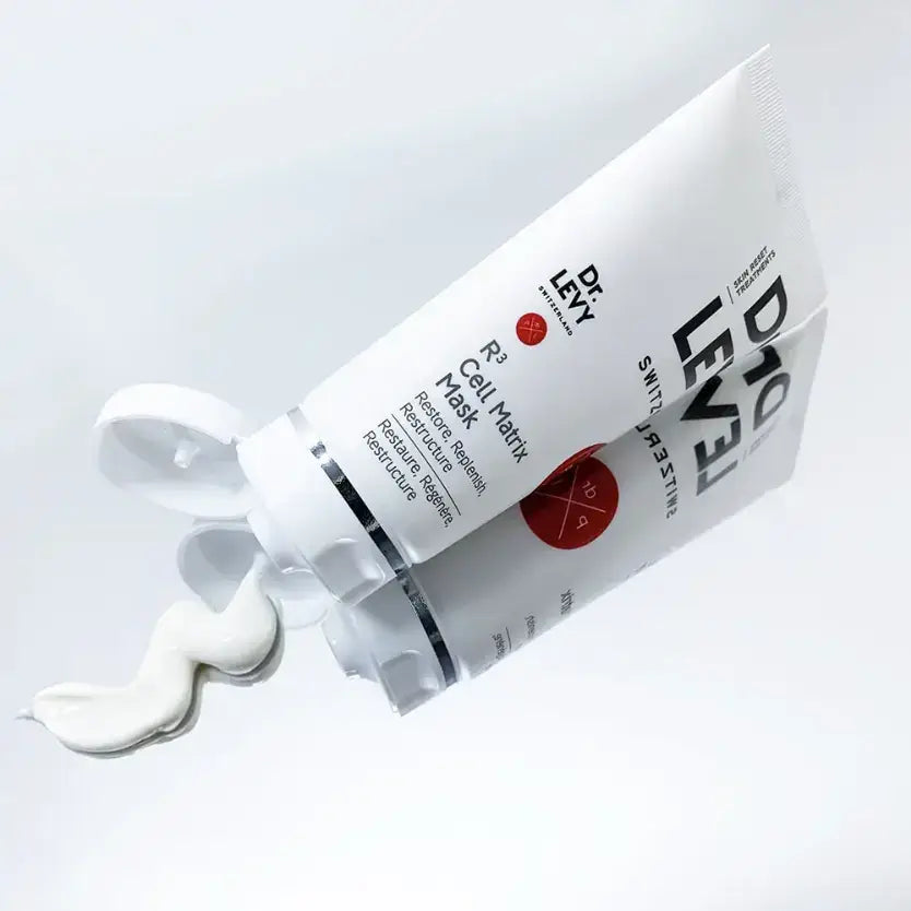 Dr LEVY Time Reverse Kit R3 Cell Matrix Mask with cream emerging from the tube for intensive skincare.