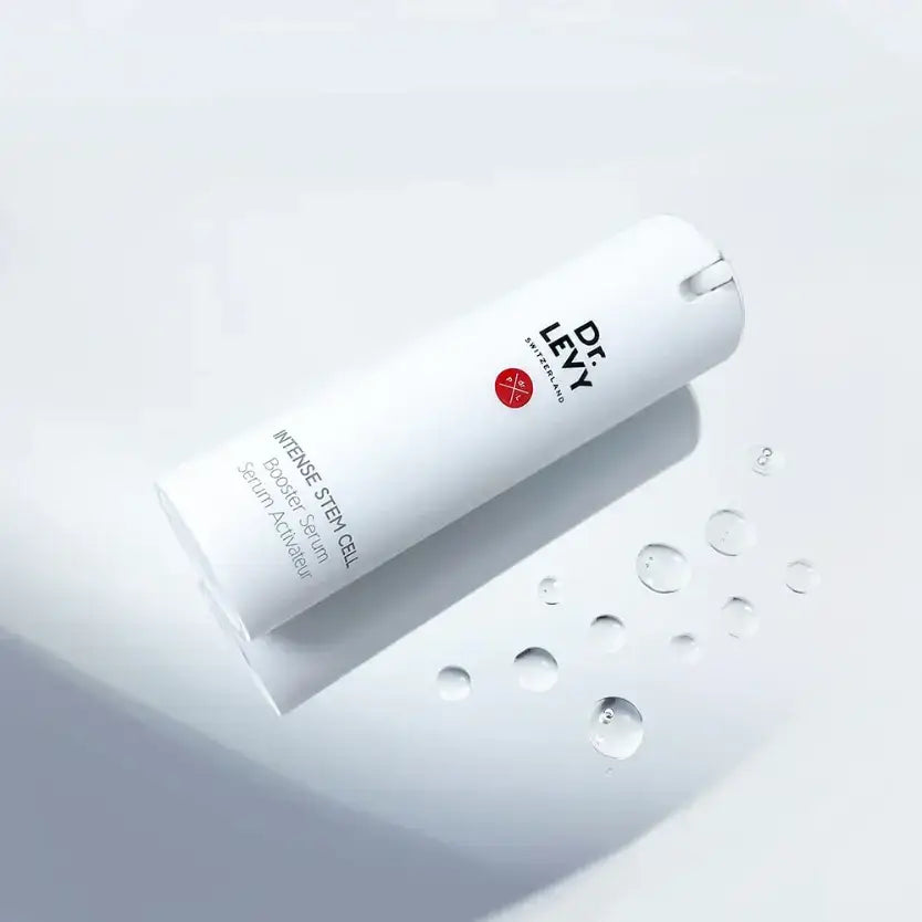 Dr LEVY Time Reverse Kit showcasing Intense Stem Cell Serum with water droplets on a white background.