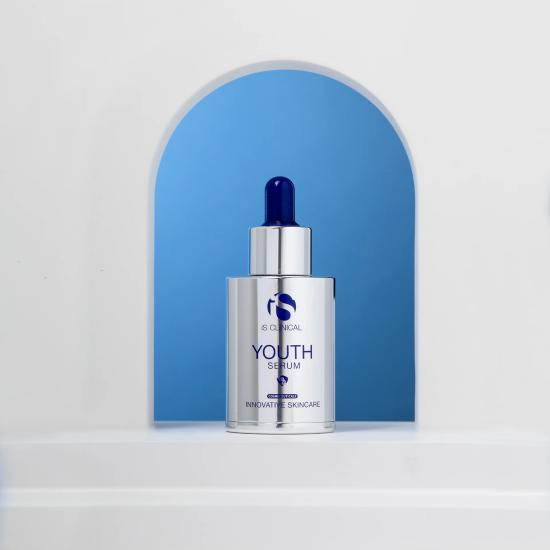 iS Clinical Youth Serum™ bottle with dropper for instant firming and anti-aging benefits.