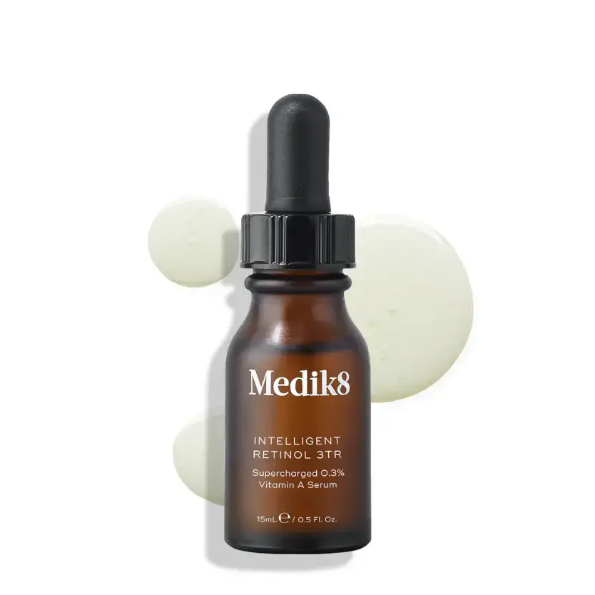 Medik8™ Intelligent Retinol 3TR serum bottle with dropper, featuring 0.3% retinol, on a clean background.