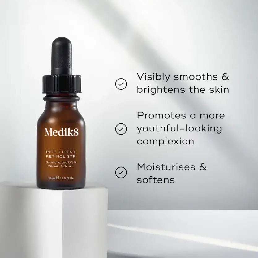 Medik8™ Intelligent Retinol serum in a dropper bottle on a light background, promotes youthful skin and moisturizes.