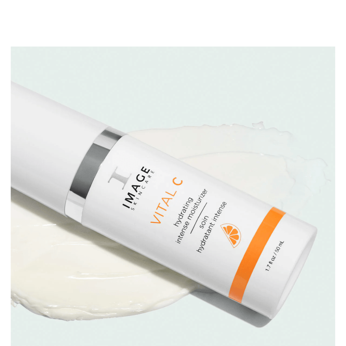 IMAGE Skincare VITAL C Hydrating Intense Moisturiser bottle beside a swatch of its smooth, creamy texture
