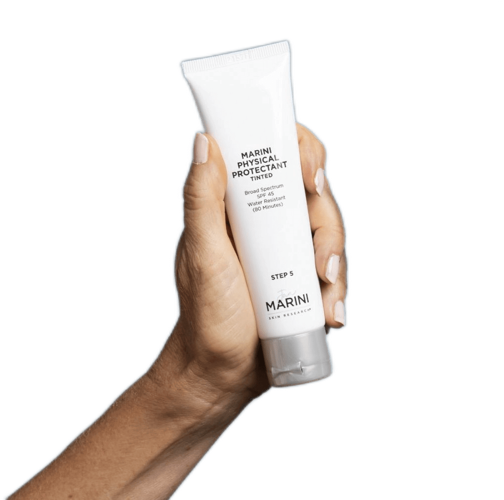 Jan Marini Regeneration Booster in a hand, showcasing its skin-hydrating properties and advanced formulation.
