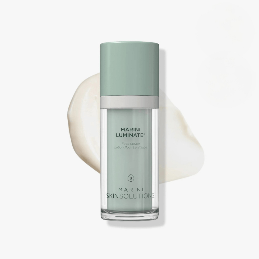 Marini SkinSolutions Luminate Face Lotion in a sleek bottle with mint-green packaging, showcasing its brightening properties.