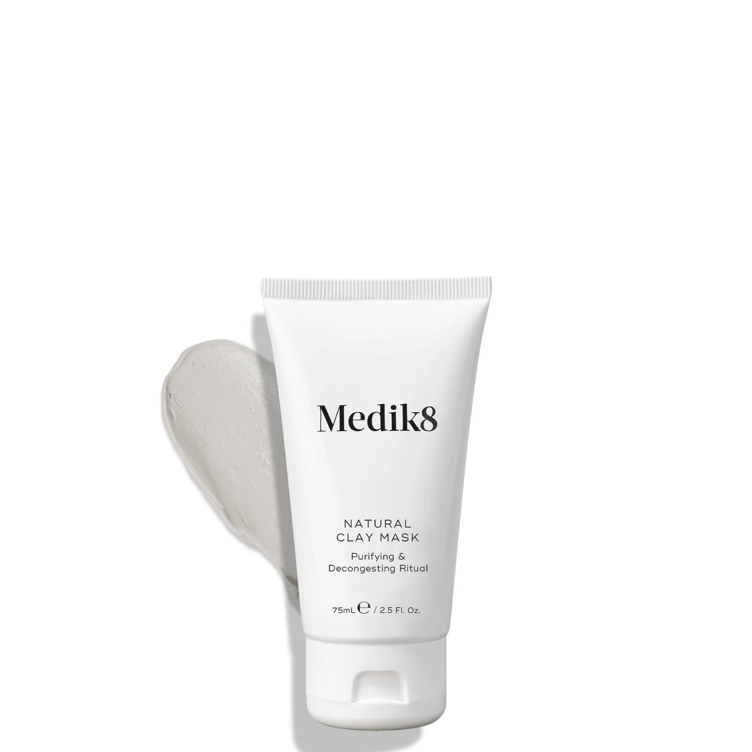 Medik8 Natural Clay Mask tube with creamy mask on a surface, perfect for refining pores and purifying skin.