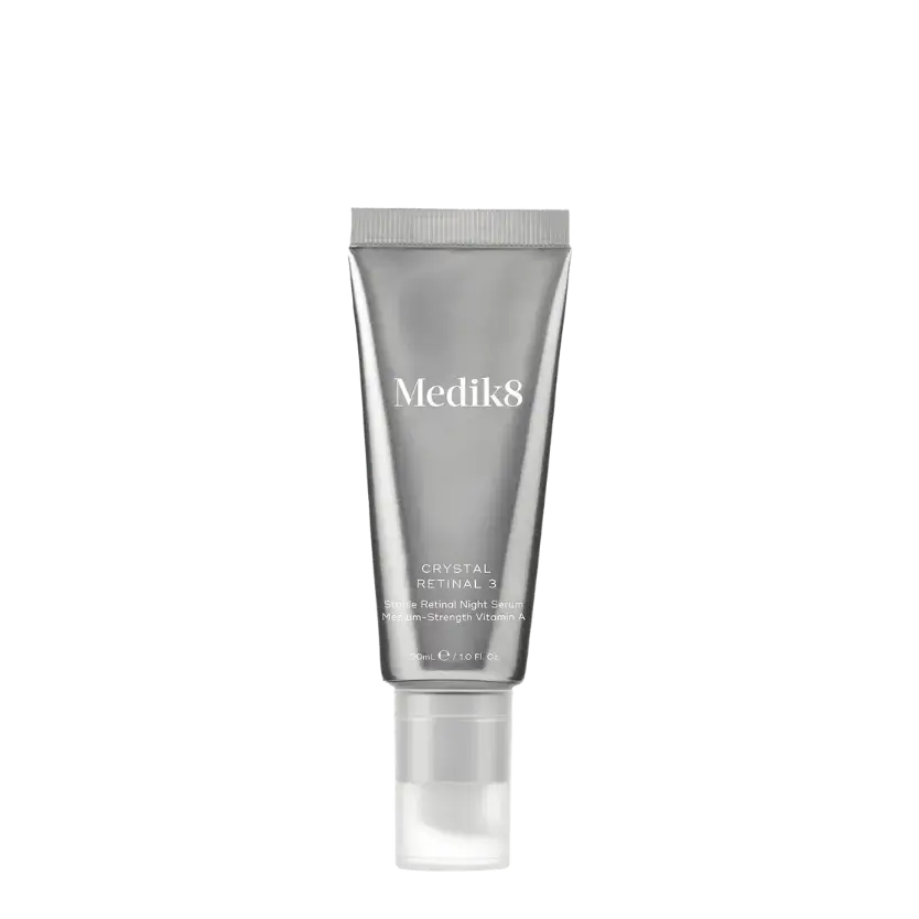 Medik8 Crystal Retinal 3™ tube with silver packaging for anti-aging skincare.