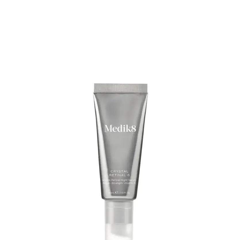 Medik8 Crystal Retinal 6™ skincare product in a sleek tube for improving skin firmness and reducing wrinkles.