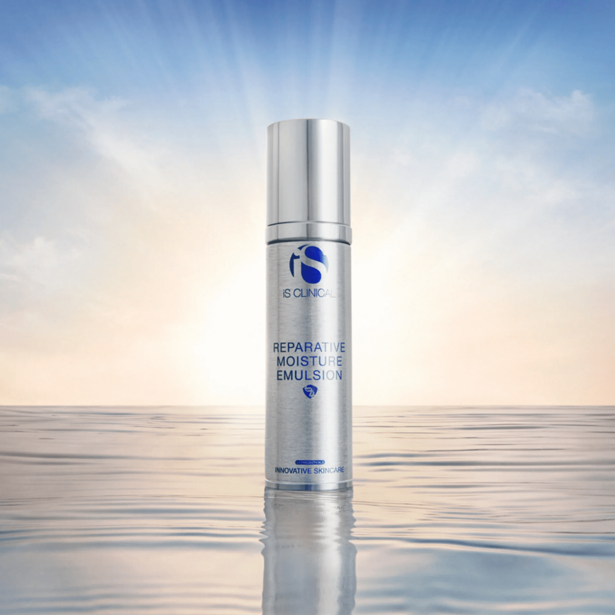 iS Clinical Reparative Moisture Emulsion™ product displayed in serene water background, highlighting hydration and skincare benefits.