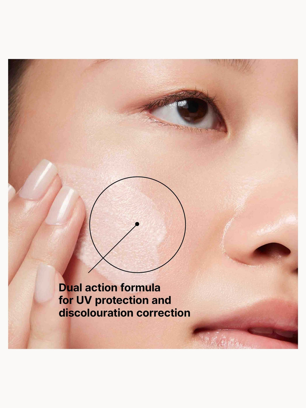 SkinCeuticals Advanced Brightening UV Defense SPF 50 lightweight lotion applied to cheek