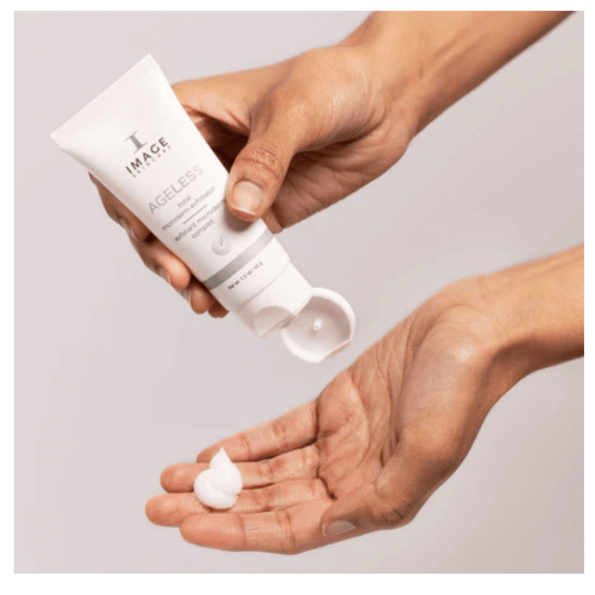 IMAGE Skincare AGELESS Total Microderm Exfoliator granular gel texture squeezed from the tube onto a hand