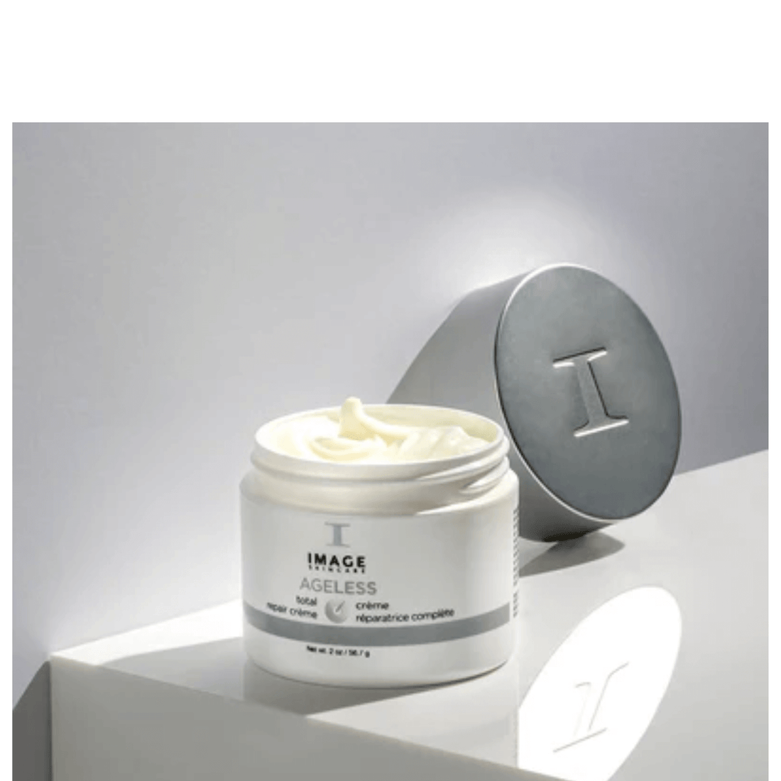 IMAGE Skincare AGELESS Total Repair Crème 56.7g white jar with silver lid, a retinol and glycolic acid night cream