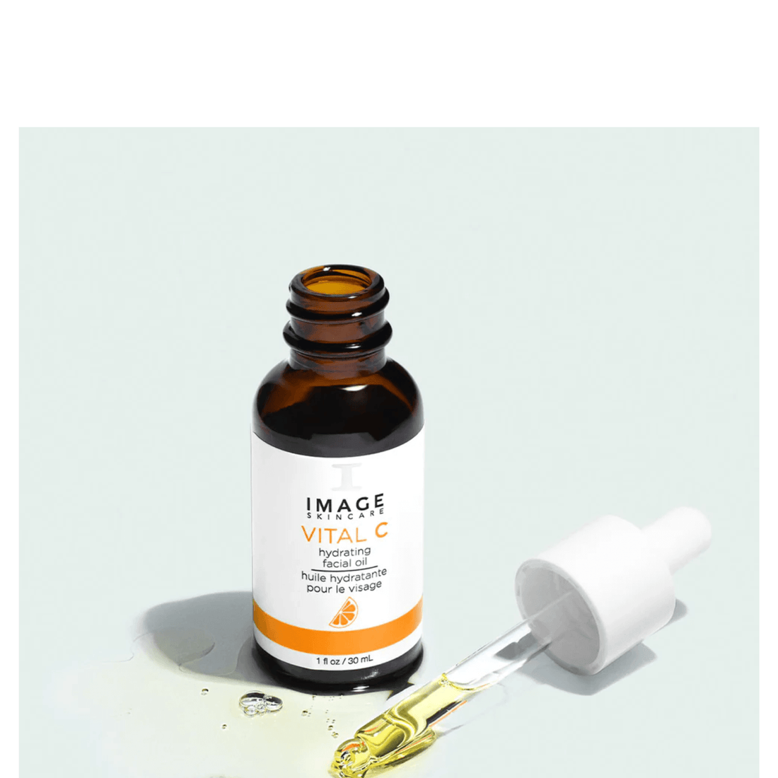 IMAGE Skincare VITAL C Hydrating Facial Oil in amber bottle with dropper, designed for nourishing and hydrating skin.